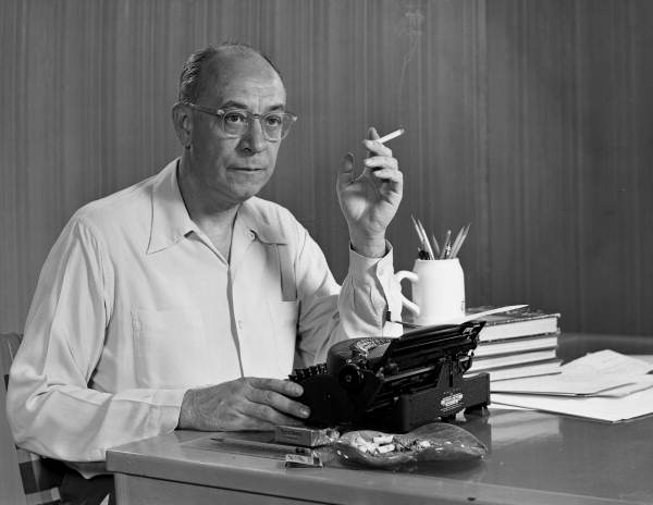 Florida Memory - Portrait Of Author Eric Hodgins Sitting By His Typewriter.