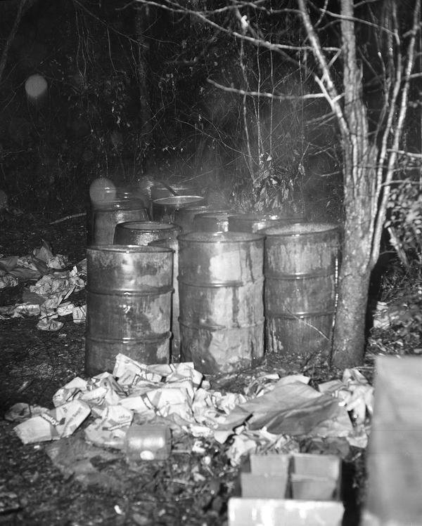Florida Memory Barrels at a moonshine still shown during raid in the