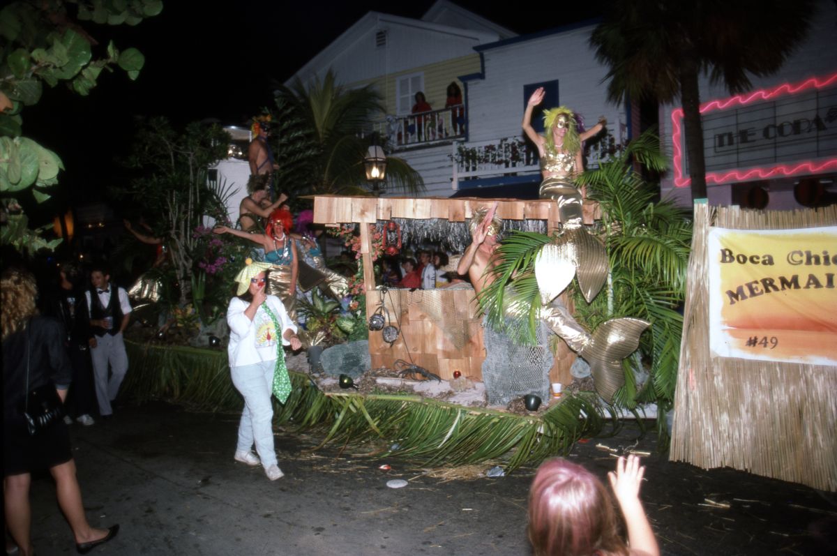 Florida Memory People dressed as mermaids on float at Duval Street