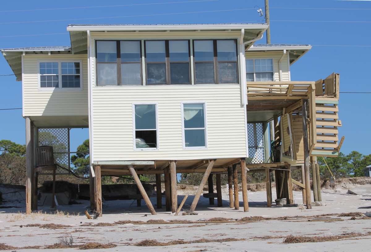 Florida Memory Closeup view showing house at Alligator Point damaged