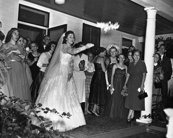 Carolyn Lucille Black Davis throwing her wedding bouquet