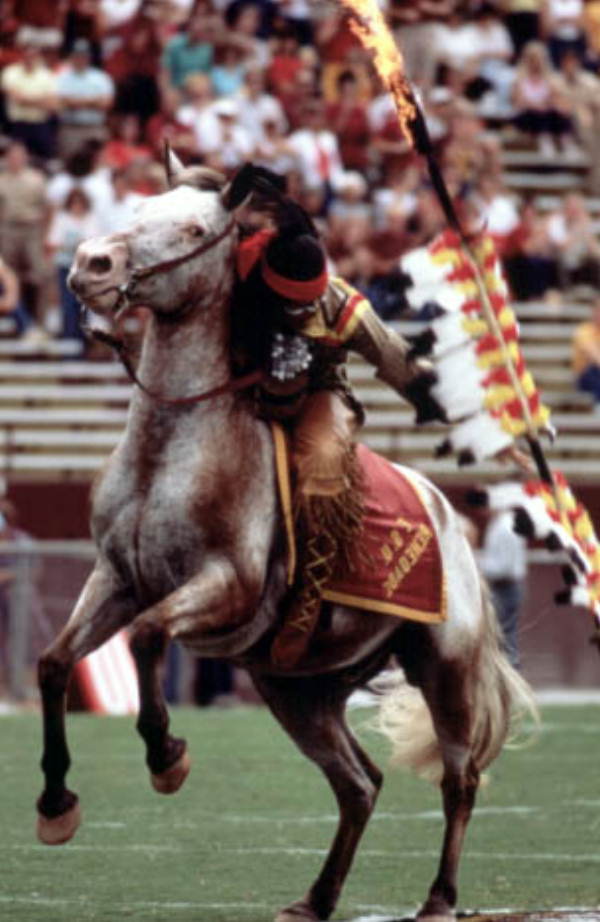 Florida Memory FSU Mascot, "Chief Osceola," riding Renegade before a